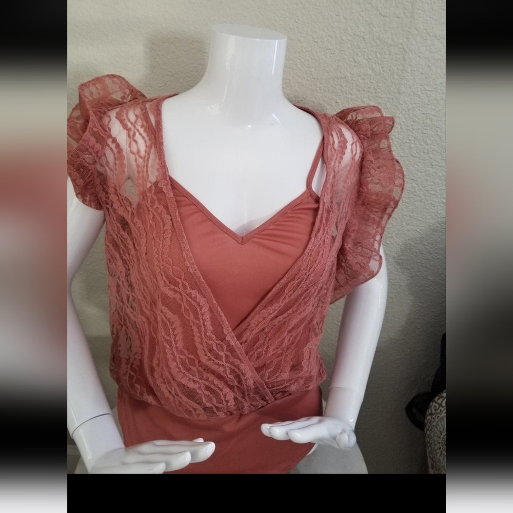 New women's body suit size L